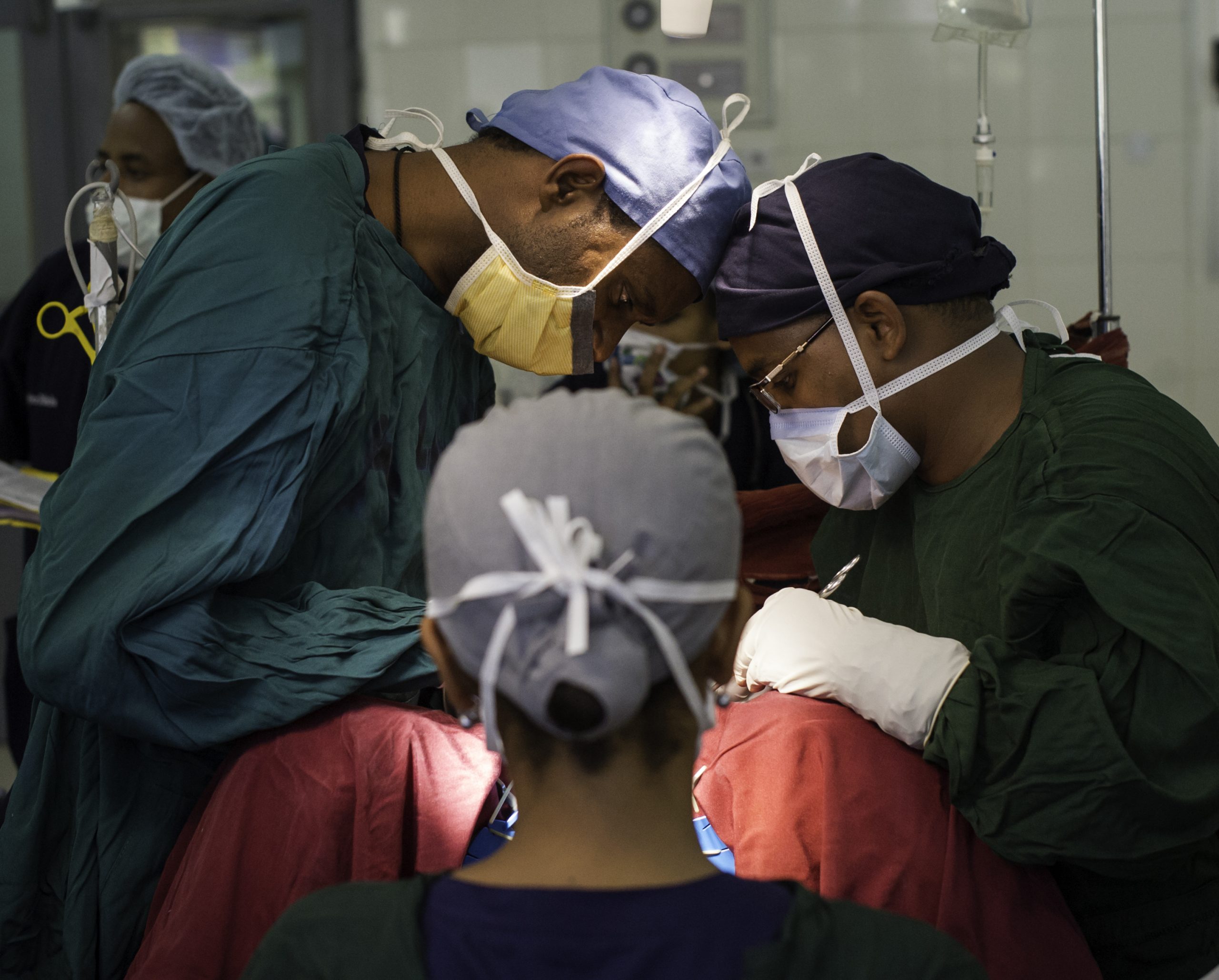 Surgical team performing surgery