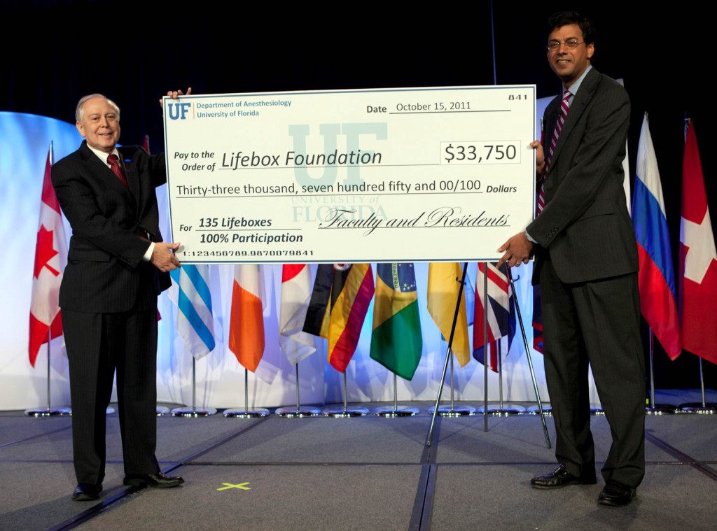 Atul-Florida-cheque-handover-Oct2011