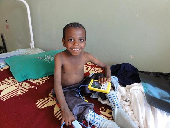 child with oximeter-small_Ethiopia_2011 (1)